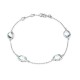 Pulsera de oro blanco 9K con 4 topacios tratados
