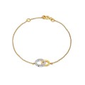 Pulseira em ouro bicolor 9k com círculos e zircónias