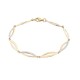 Pulsera de oro de 18K amarillo rodiado y ondas de circonita