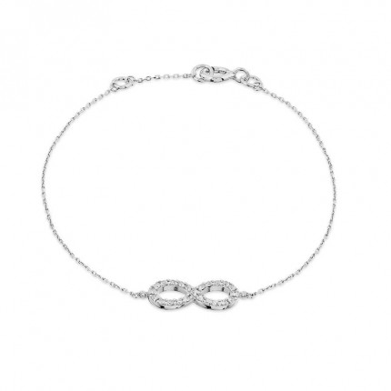 Pulsera de oro blanco de 18K símbolo infinito de circonitas