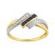 Anillo de oro bicolor con zafiro y barra de circonita