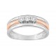 Anillo trilogía de oro bicolor 9K con diamantes 0.05 ct