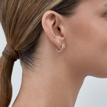 Brincos em ouro bicolor 9 kt meio aro com zircónia
