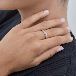 Anillo de oro bicolor 9 KT con circonita