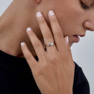 Anel em ouro bicolor 9 kt 3 zircónias