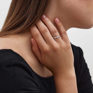 Meia aliança em ouro branco 9 kt com zircónia