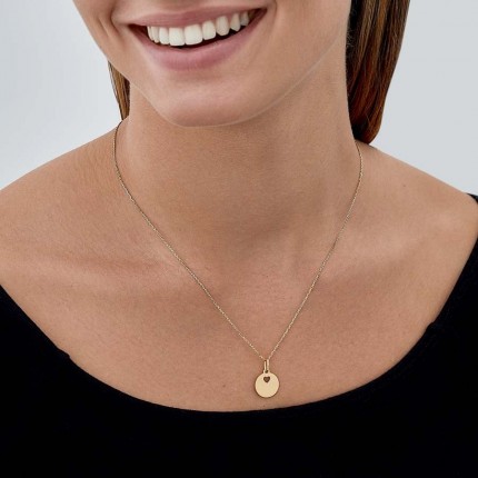 Pendente em ouro amarelo 9K com circulo e coração perfurado