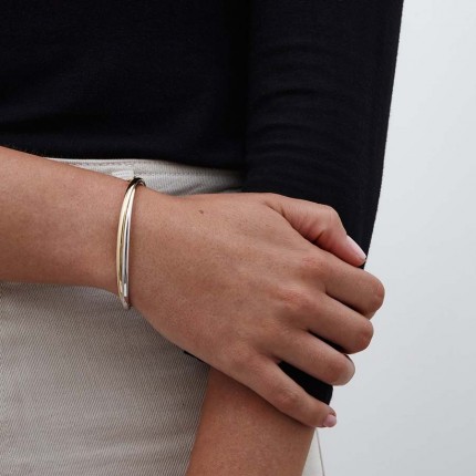 Pulsera de oro bicolor 9 KT de rígida