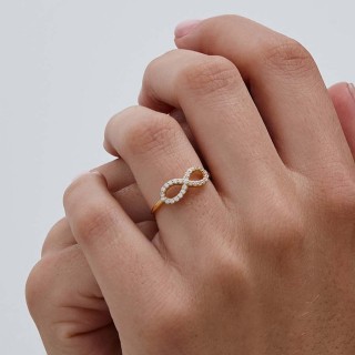 Anel em ouro amarelo 9 kt com infinito e zircónia