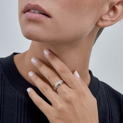 Anillo de oro bicolor 9 KT con circonita y rodio