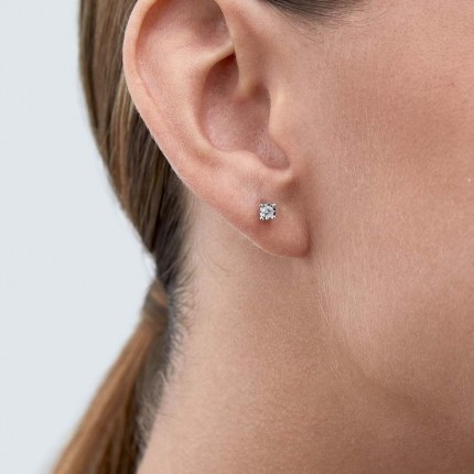 Pendientes de oro blanco 9K 4 garras pastilla diamante 0.14CT