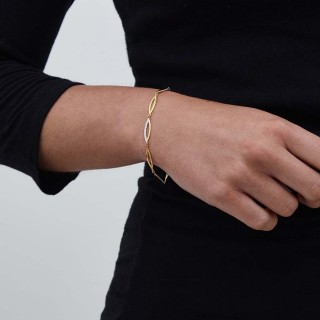 Pulsera de oro bicolor 9k y circonita