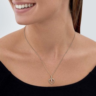 Colgante de oro amarillo 9K con corazón y circonita