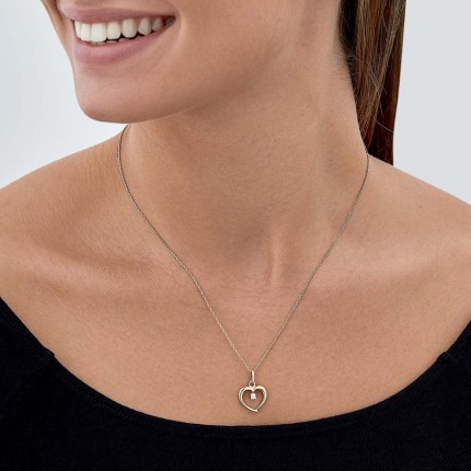 Colgante de oro amarillo 9K con corazón y circonita