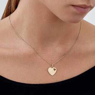 Colgante de corazón en oro amarillo 9K con corazón calado