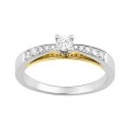 Solitario de oro blanco 18K con diamantes laterales 0.25 ct