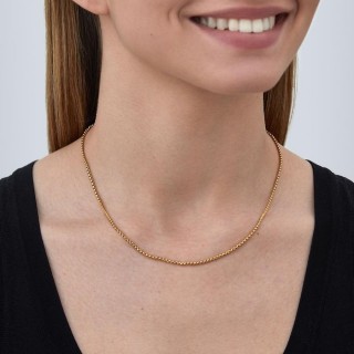 Collar de acero dorado