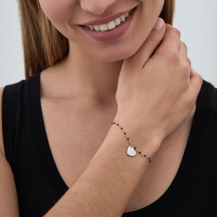 Pulseira em aço com círculo e bolinhas pretas de 16+3 cm