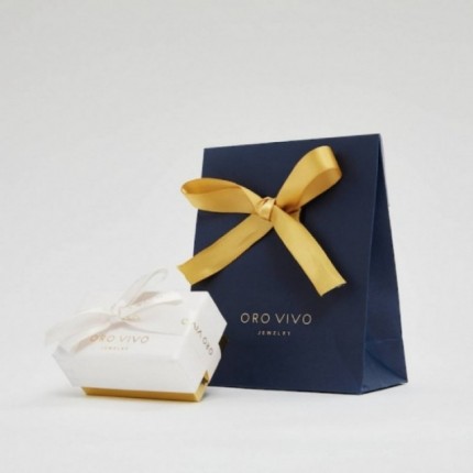 Anillo solitario de oro amarillo rodiado 18K con circonita central