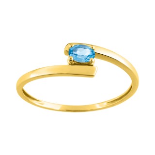 Anillo de oro amarillo 9K con topacio azul