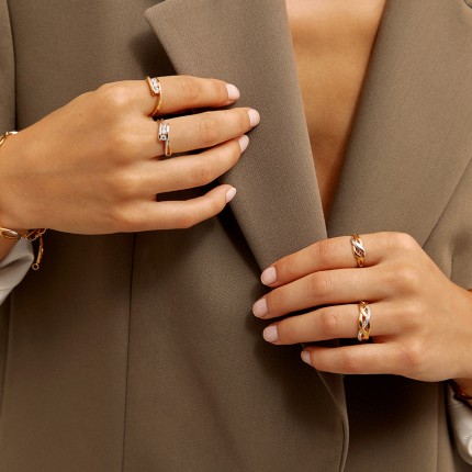 Anillo de ondas bicólore bañado en oro