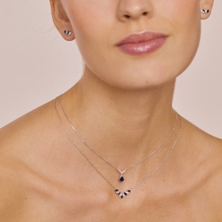 Collar de oro blanco 18K con diamante 0,06 ct y zafiro