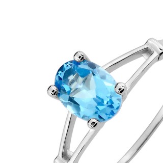 Anillo de oro blanco de 9K con topacio oval