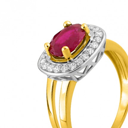 Anillo de oro bicolor 9K rubí ovalado con circonita