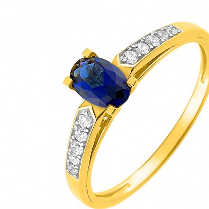 Anillo bañado en oro con circonita azul