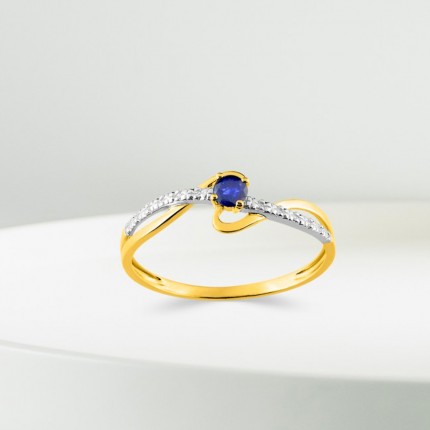 Anillo de oro bicolor con zafiro