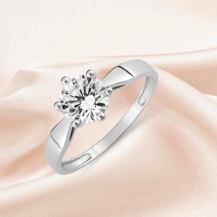 Anillo de oro blanco 9K con circonita central y 6 garras