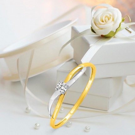 Anel em ouro bicolor 9 kt cruzado zircónia