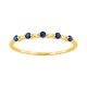 Anillo de oro amarillo de 18k con zafiros azules