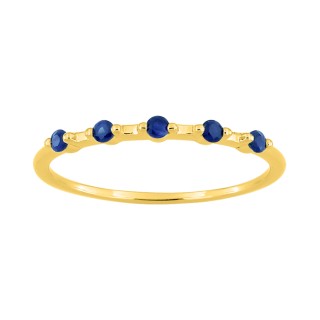Anillo de oro amarillo de 18k con zafiros azules