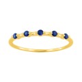 Anillo de oro amarillo de 18k con zafiros azules
