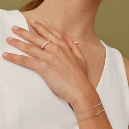 Media de alianza oro amarillo 9K con 12 circonitas en garras