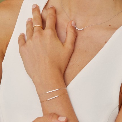 Pulseira em ouro branco 9K com zircónias centrais
