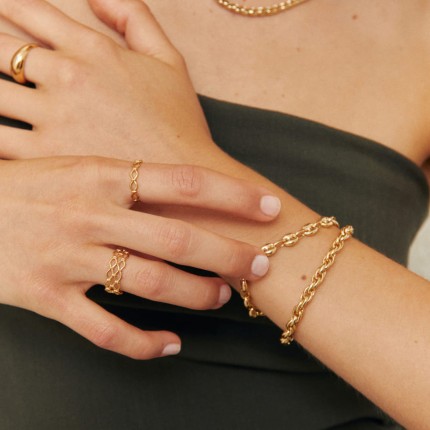 Anillo trenzado y calado de oro amarillo 9K