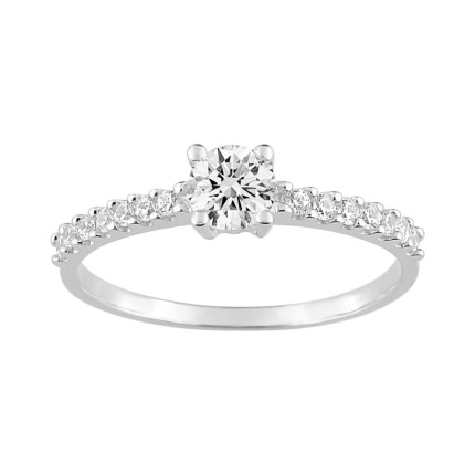 Anillo solitario de oro blanco 18K circonitas laterales y central