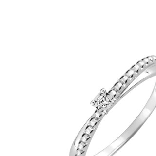 Anillo solitario oro blanco 9K engastado con 4 garras y diamantes de 0,02 ct