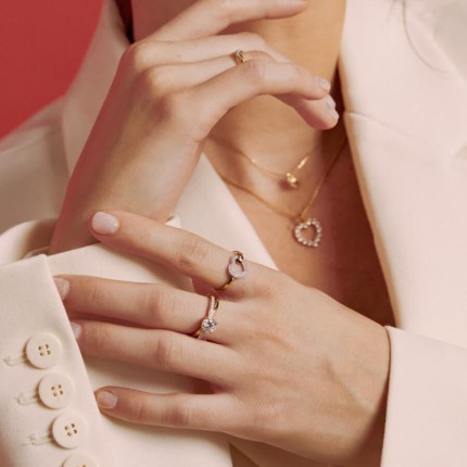 Anillo oro bicolor 9 KT corazón abierto circonita