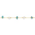 Pulseira em aço dourado adornada com turquesas criadas e ágatas brancas