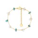 Pulsera de acero dorado adornada con turquesas creadas y ágatas blancas