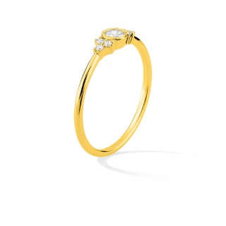 Anillo de oro amarillo 18K adornado con un circonita central acompañado