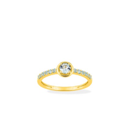 Anel solitario acompanhado de ouro 9K amarelo com topacio azul
