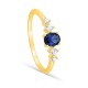 Anillo solitario bañado en oro con circonitas azul y blancas