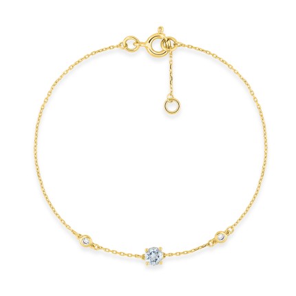Pulseira em ouro amarelo 9k  com uma água-marinha e duas zircónias