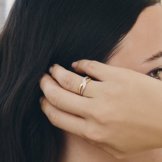 Anel cruzado em ouro bicolor de 9K diamante 0,01 ct