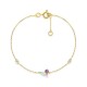 Pulsera de oro amarillo de 9K con un trío de piedras que incluyen iolita, topacio azul tratado y circonita