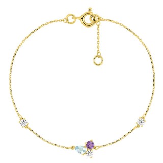 Pulsera de oro amarillo de 9K con un trío de piedras que incluyen iolita, topacio azul tratado y circonita